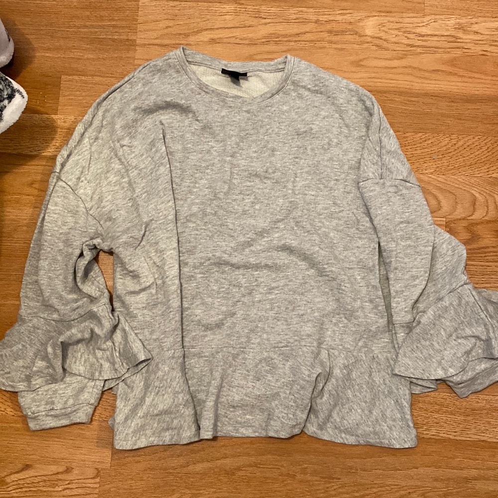 Sweater with flared sleeves